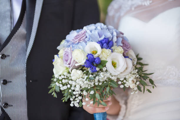 istock Wedding bouquet in bride's hand 1068303146