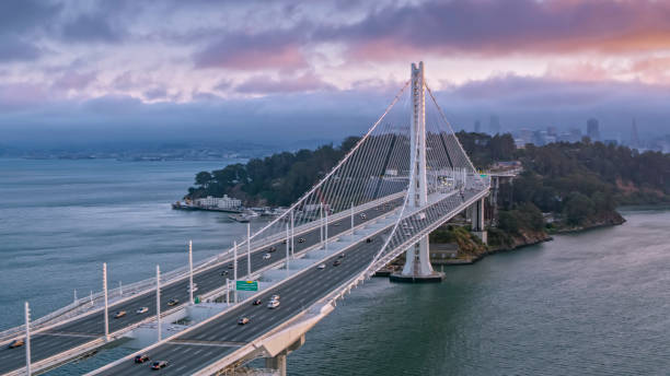 Aerial view of the Dwight D. Eisenhower highway at sunset Aerial view of Dwight D. Eisenhower highway and Yerba Buena Island between Oakland and San Francisco, California, USA. alameda county stock pictures, royalty-free photos & images