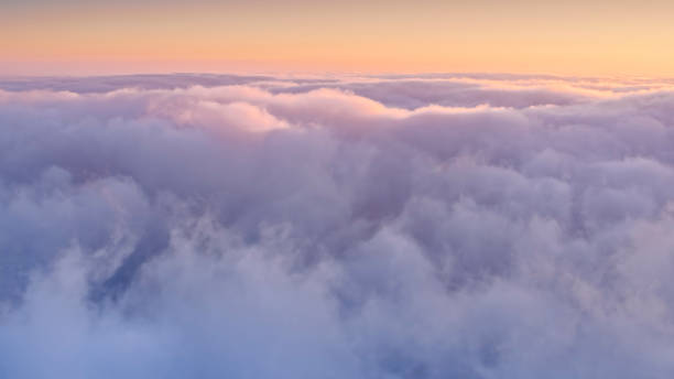 istock Aerial view of the puffy clouds at sunset 1068309118