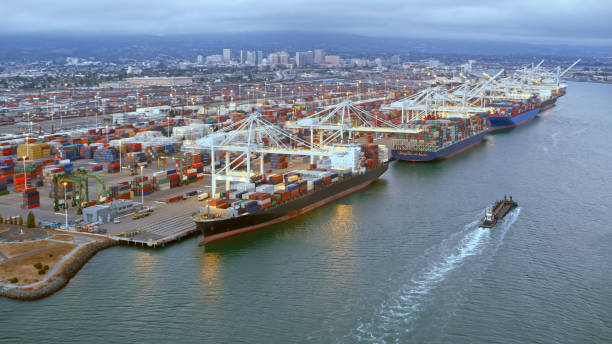 istock Aerial view of cargo ship loading docks in USA 1068309142