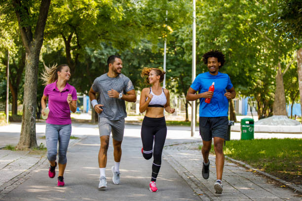 istock Friends running together outdoors 1068310046