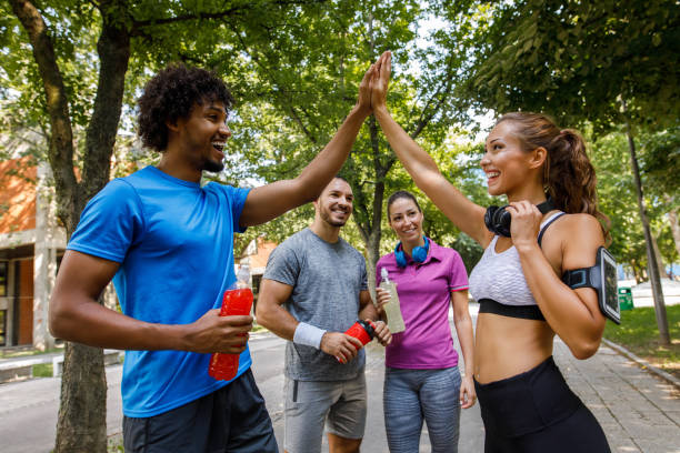 istock Couple giving each other high five after hard training 1068314862