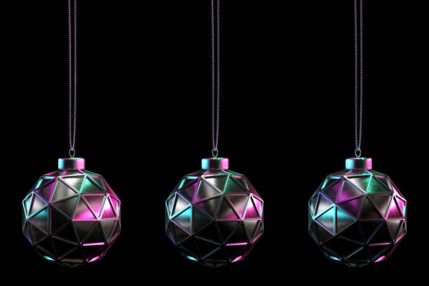 istock Shiny christmas ball set in colored light hanging isolated on black background 1068322620