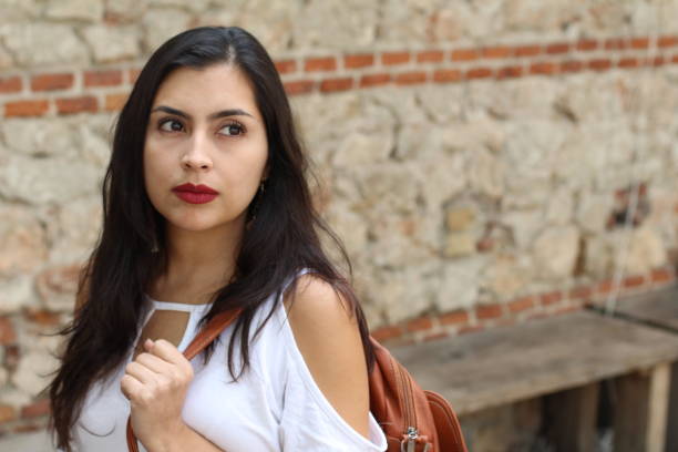 Strong looking ethnic woman with copy space.
