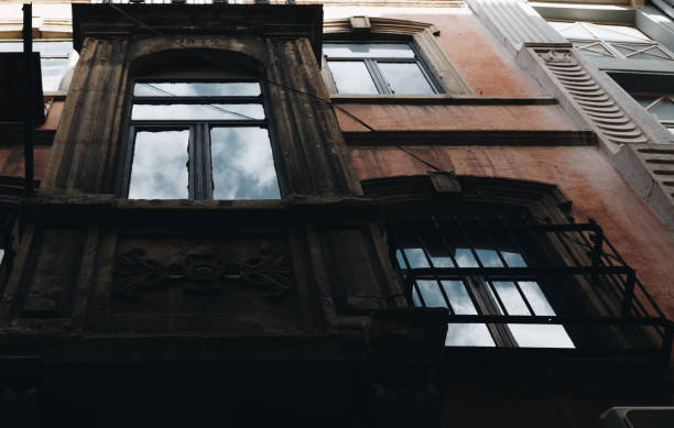 istock old facade with reflection of the sky 1068332904