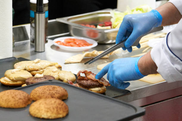 istock A closeup of a hamburger cooking process. 1068334876