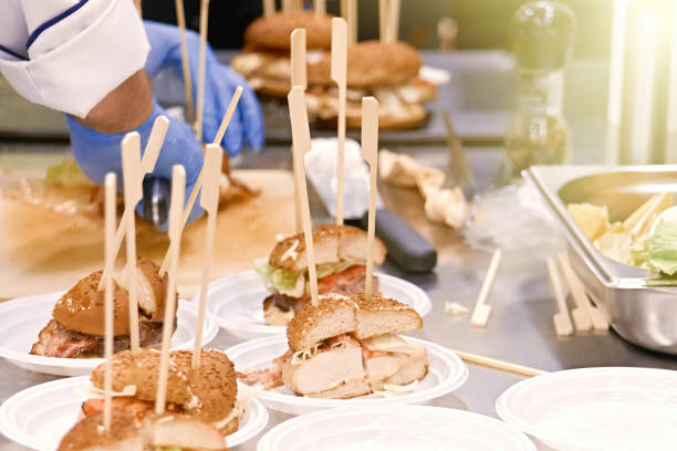 A closeup of a hamburger cooking process.