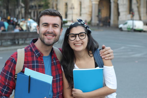 istock Smart looking couple of students 1068335298