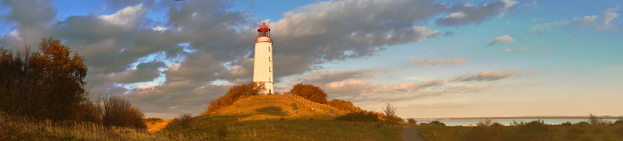 Autumn panoramic image of Hiddensee island on Baltic sea with white lighthouse Dornbusch in Mecklenburg-Vorpommern, Northern Germany