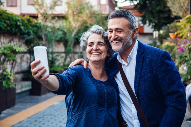 istock Tourist senior couple taking a selfie 1068343428