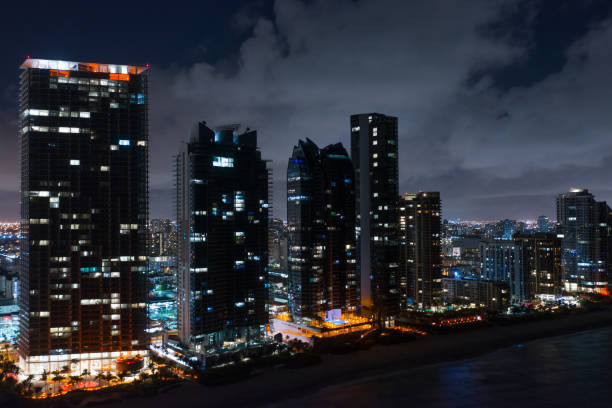 istock Highrise buildings at night 1068343580