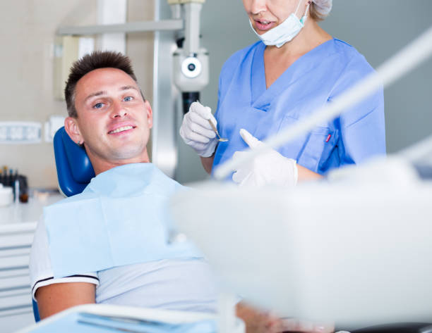 istock Male patient waiting for dental procedure 1068346436