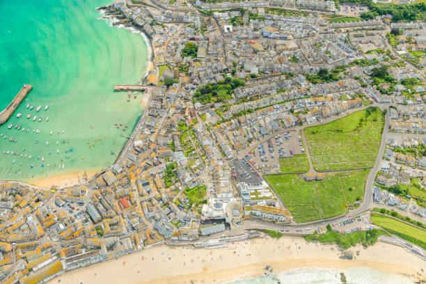 istock Aerial Views over St. Ives, Cornwall, England on a bright June day. 1068348146