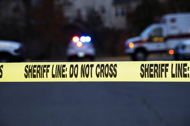 istock Crime scene with marked emergency vehicles 1068350000