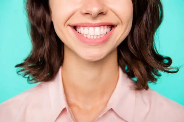 Photo of White healthy strong teeth concept. Close-up cropped fresh clean shiny perfect teeth cheerful girl isolated over turquoise teal pastel background