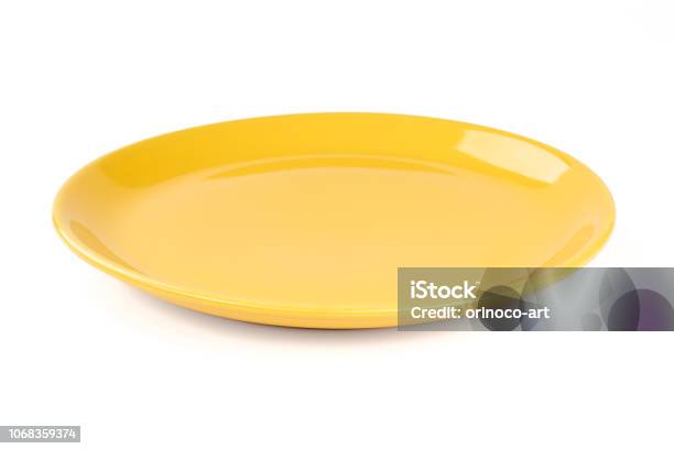 Yellow Pastel Plate Isolated On White Background Stock Photo - Download Image Now - Plate, Yellow, Cut Out