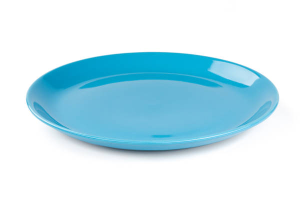 istock Blue pastel plate isolated on white background 1068359400