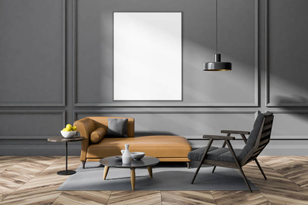 istock Gray living room, brown sofa and poster 1068361560