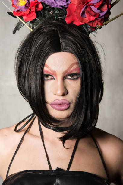 istock Travesty actor. Attractive guy in the female. 1068362472