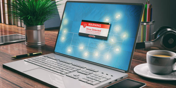 istock Warning virus detected on a laptop screen, office background. 3d illustration 1068364230
