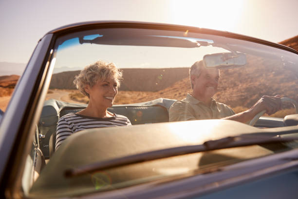 istock Couple on road trip, seen through car windscreen, close up 1068365046