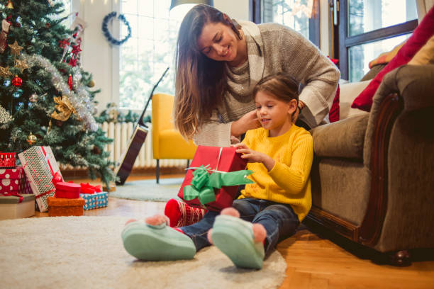 istock mother and daughter enjoying Christmas 1068373364