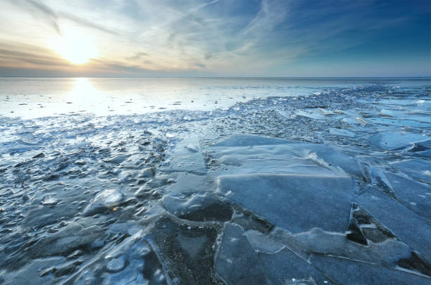 istock sunset over big frozen lake, Ijsselmeer, Netherlands 1068373372