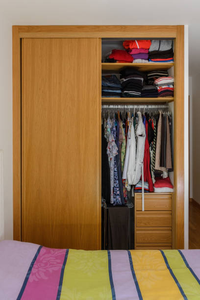 istock wardrobe with clothes in the bedroom 1068384526