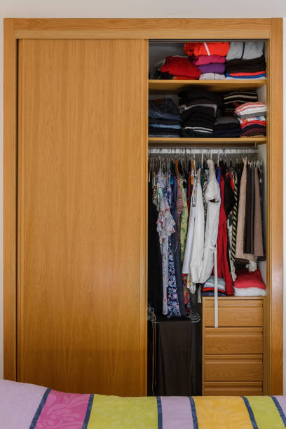 istock wardrobe with clothes in the bedroom 1068384586