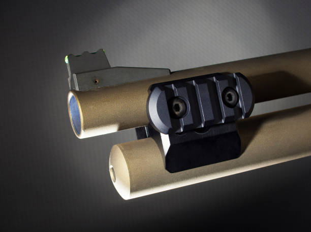 istock Rail attached to a shotgun barrel and magazine 1068385236