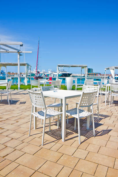 istock Patio Seating with View of Italian Harbor 1068387048