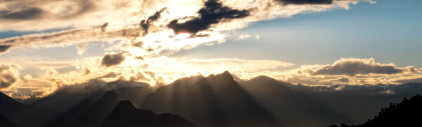 istock Panoramic view of high mountains over cloudy sunset sky in Antalya 1068389944