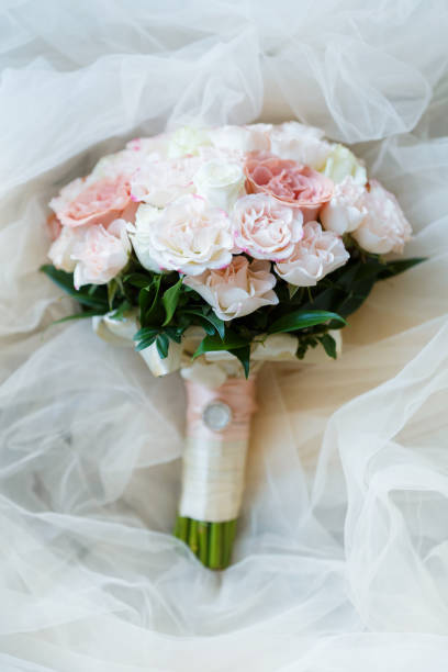 istock Sweet bride bouquet with beautiful fresh roses 1068391060