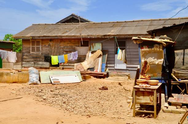 istock Clothes Drying On Clothesline By House Against Sky 1068391282