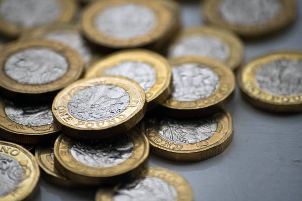 istock Pile of one pound coins 1068393372