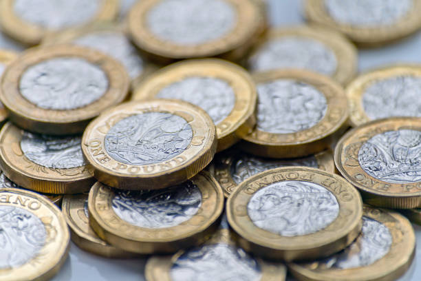 istock Pile of one pound coins 1068393424