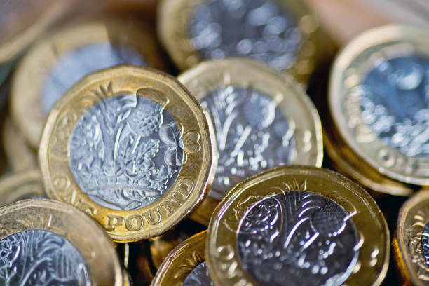 istock Pile of one pound coins 1068393624