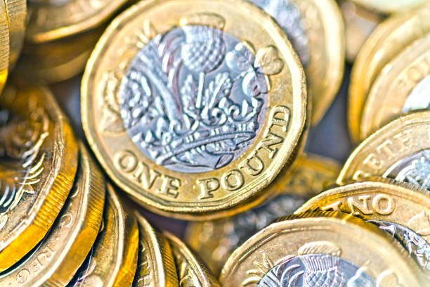 istock Pile of one pound coins 1068393908