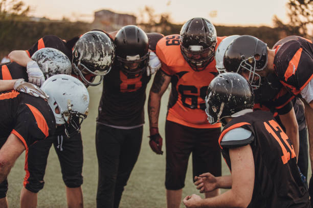 istock American football team on field 1068401862