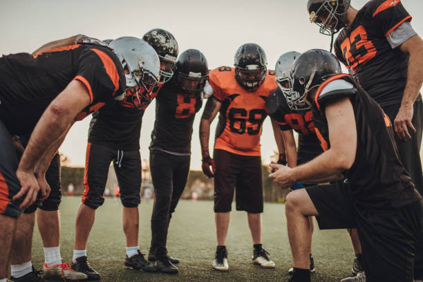 istock American football team on playing field 1068403354