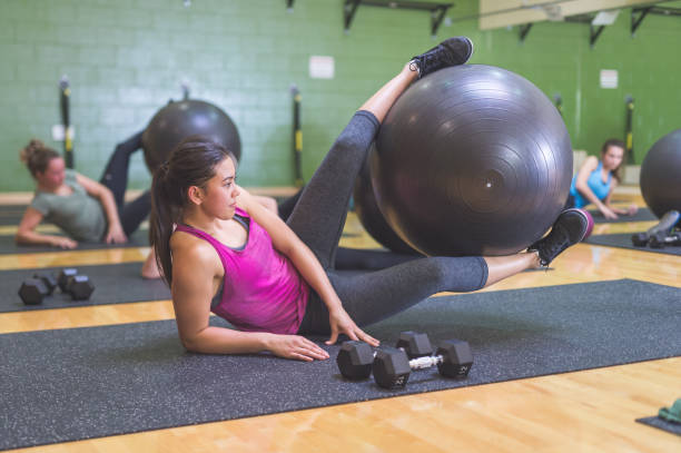 istock A co-ed group exercises together at the gym 1068408156
