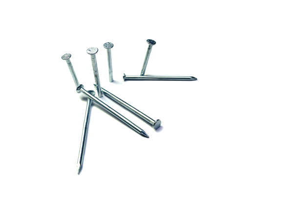istock group of nails pegged on white  background isolated 1068409304