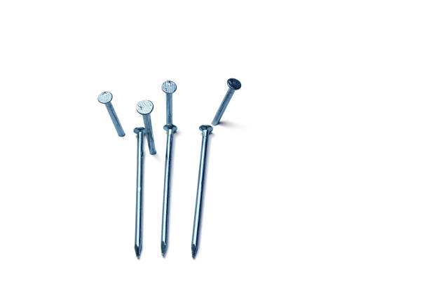 istock group of nails pegged on white  background isolated 1068409306