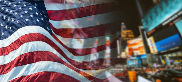 american flags against time square in nyc