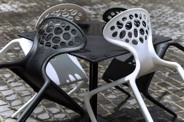istock chairs in a street cafe 1068419208