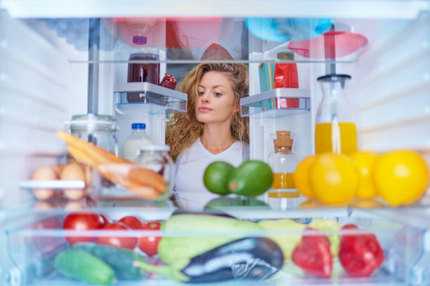 istock Woman looking something to eat. 1068419280
