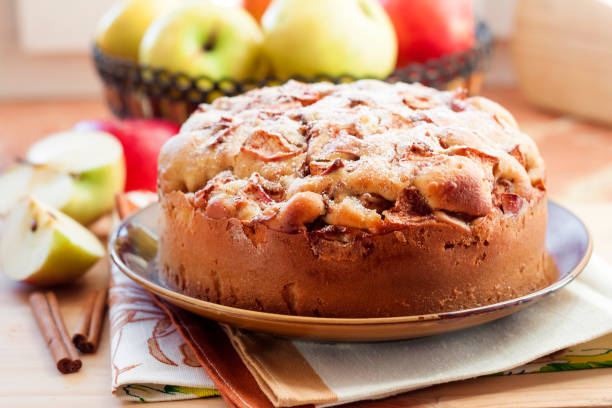 istock Homemade apple pie with cinnamon on the plate 1068419688