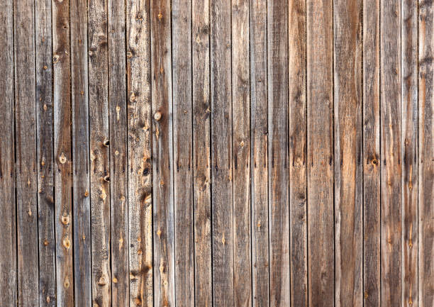 istock Natural old vintage weathered brown solid wooden fence. Abstract copy space background. 1068423200