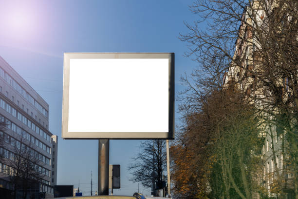 istock blank horizontal billboard on road with city view background 1068425530