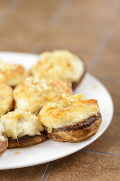 istock Mushrooms stuffed with crab and cheese baked 1068426322